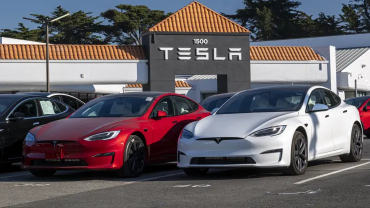 Tesla cuts Model 3 and Model Y prices in the U.S. after car deliveries fall - CNBC