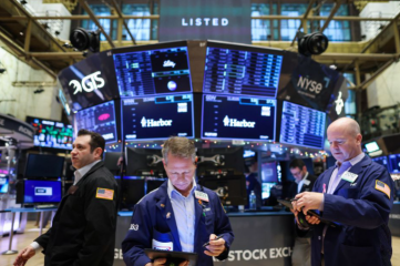 Wall St rallies as jobs, services data calm rate hike worries