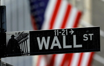 Wall St slips as Treasury yields rise, oil prices boost energy sector