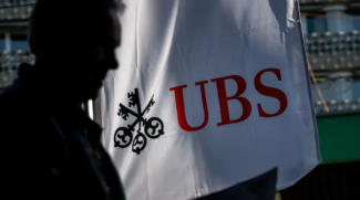 UBS says it has completed the takeover of stricken rival Credit Suisse