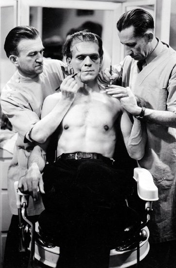 Jack Pierce doing Boris Karloff’s makeup on the set of Frankenstein, 1931